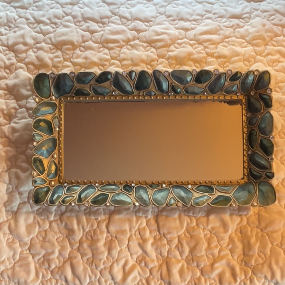 Teal and gold colored mirror decorative try.